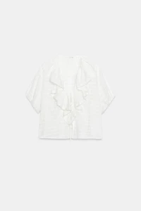 BLOUSE À VOLANTS ET LACETS
