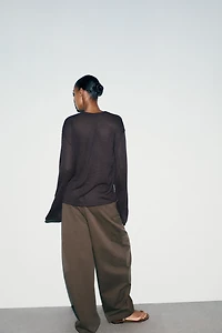 TOP EN MAILLE AJOURÉ