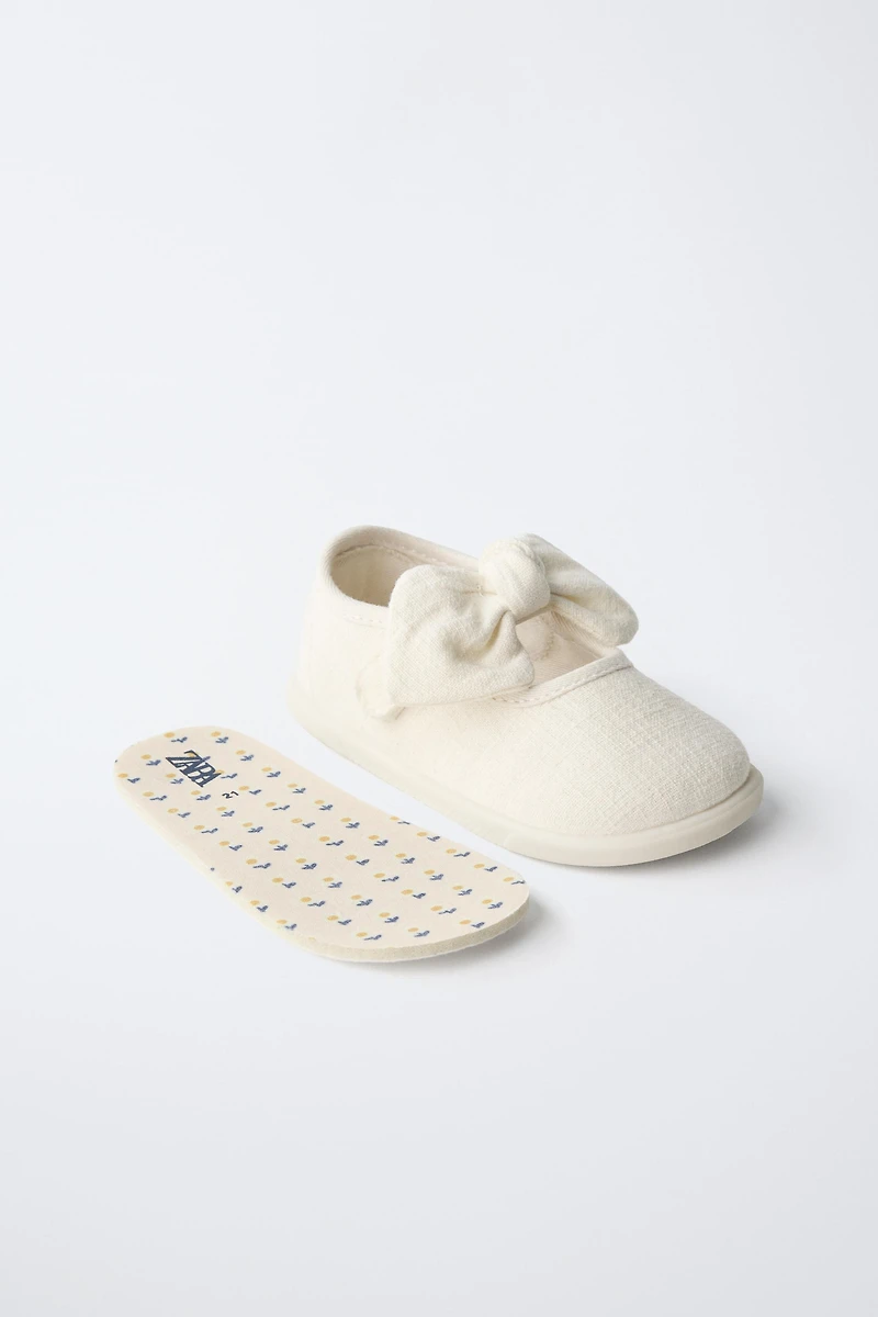 BAREFOOT BALLET FLATS WITH BOW