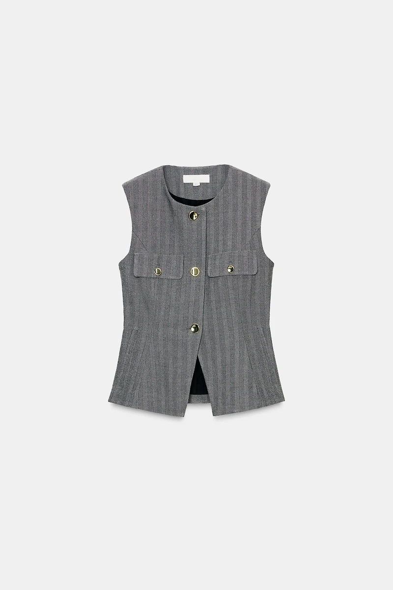GILET CHEVRON ÉVASÉ
