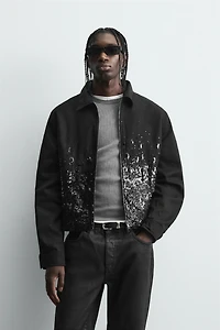 VESTE COURTE À PAILLETTES