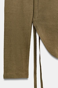 RUSTIC T-SHIRT WITH DRAWSTRINGS