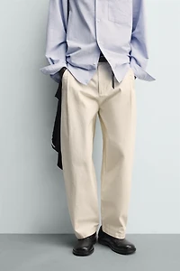 BALLOON FIT PLEATED PANTS