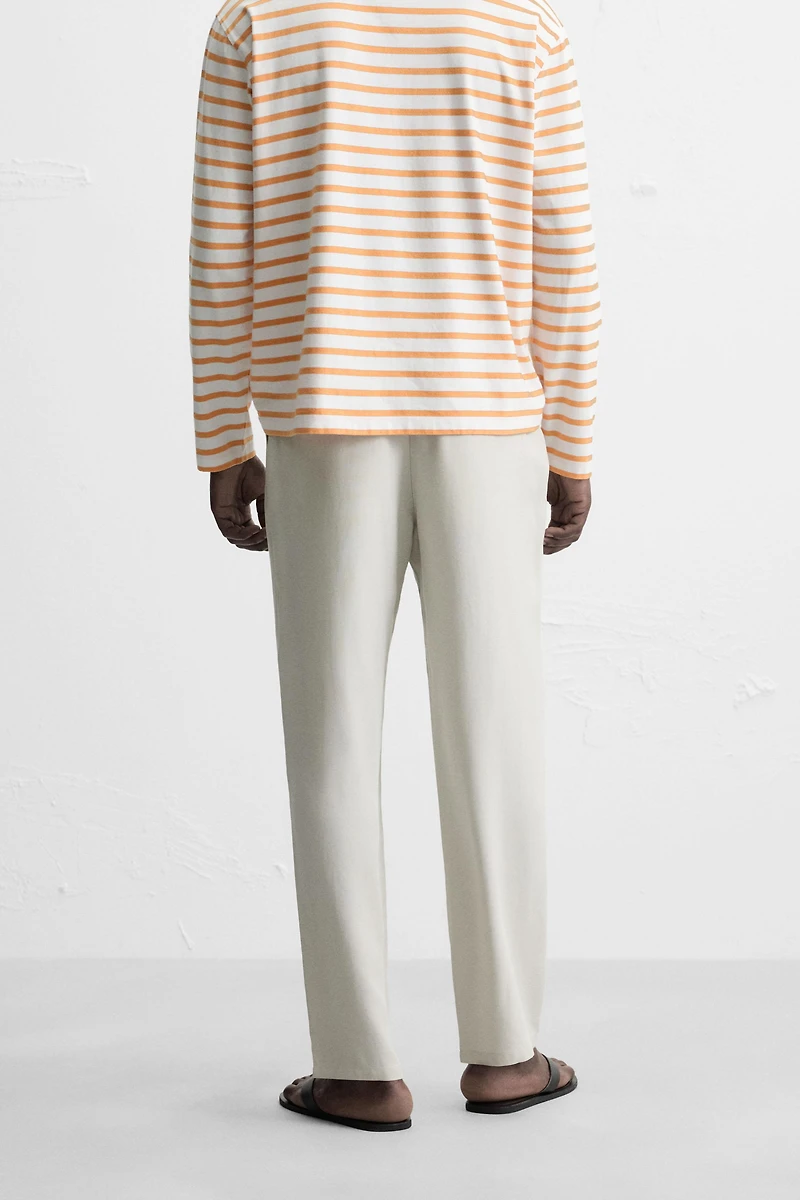 RELAXED FIT FLOWY PANTS