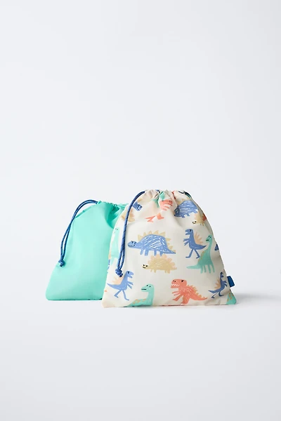 PACK OF DINOSAUR TRAVEL BAGS