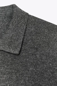 VESTE EN MAILLE À REVERS EFFET FOURRURE