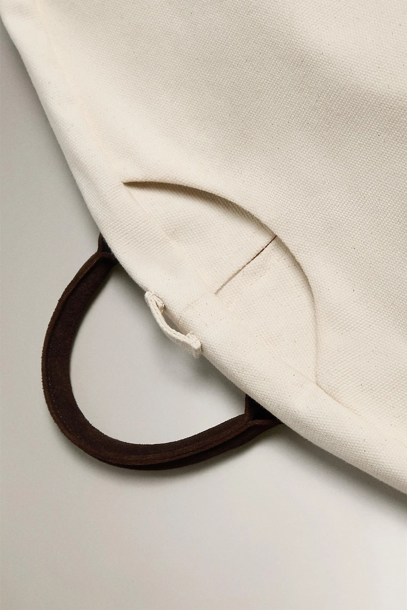 TRAVEL GARMENT BAG WITH LEATHER DETAIL