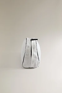 TERRY CLOTH TOILETRY BAG WITH PIPING DETAIL