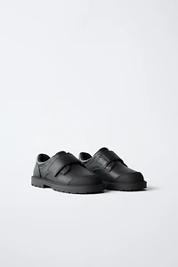 CHAUSSURES EN CUIR