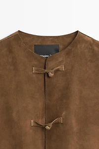 Veste à col officier en cuir finition daim