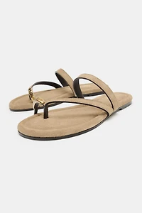 FLAT SUEDE SANDALS WITH APPLIQUÉ