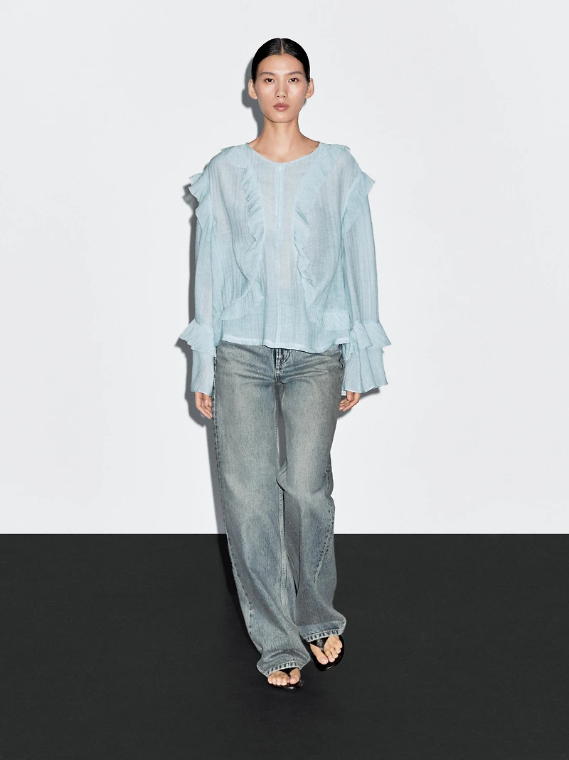 Flowing blouse with ruffles