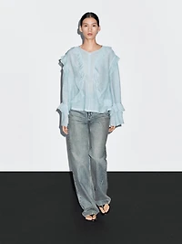 Flowing blouse with ruffles