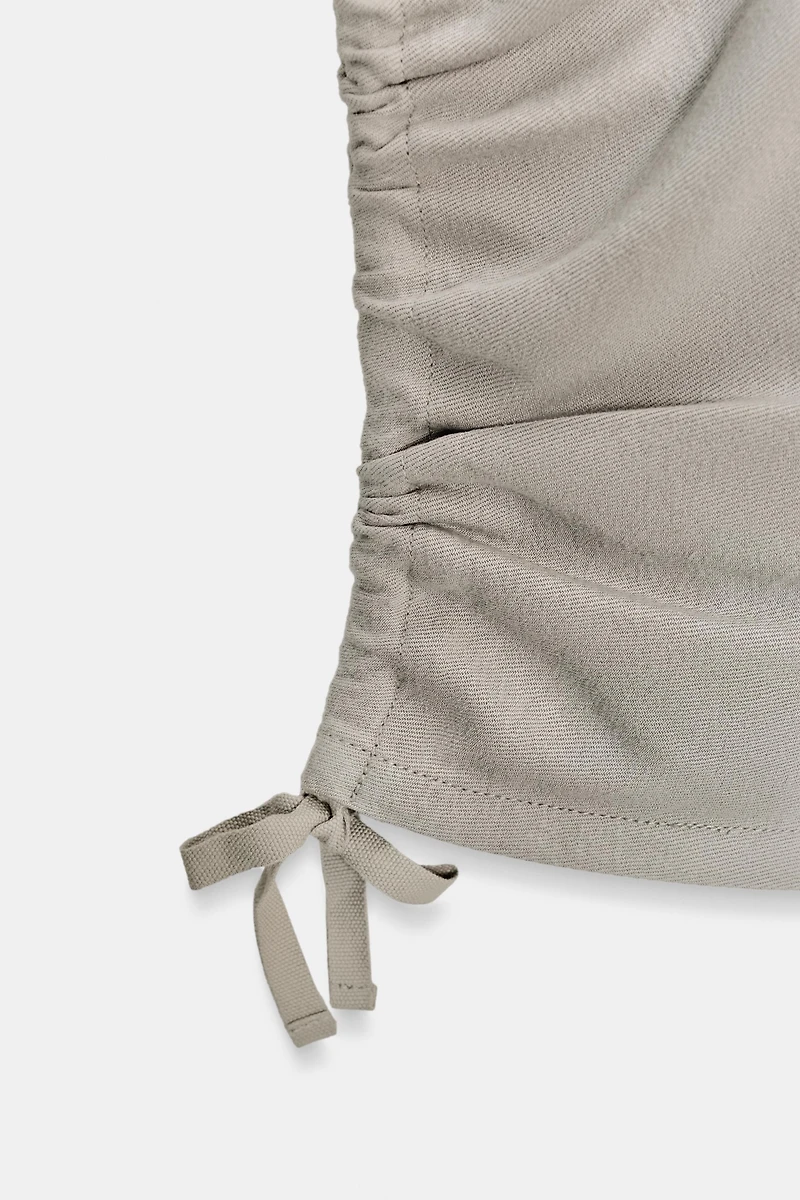 PANTALON CAPRI À PLIS