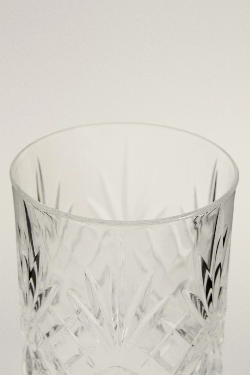 CRYSTALLINE TUMBLER WITH RAISED DESIGN