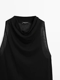 Sleeveless top with draped neckline