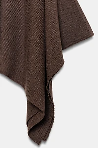 ASYMMETRIC KNIT MIDI SKIRT