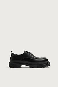 CHAUSSURES CHIC À BORDURE ET VOLUME