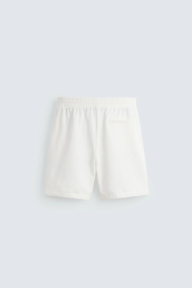 BERMUDA DE JOGGING DÉLAV