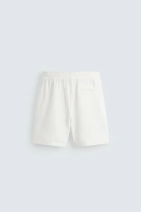 BERMUDA DE JOGGING DÉLAV