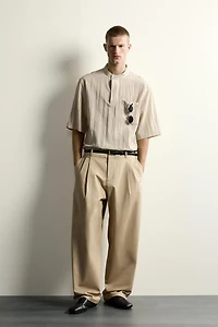 FLOWY POLO SHIRT