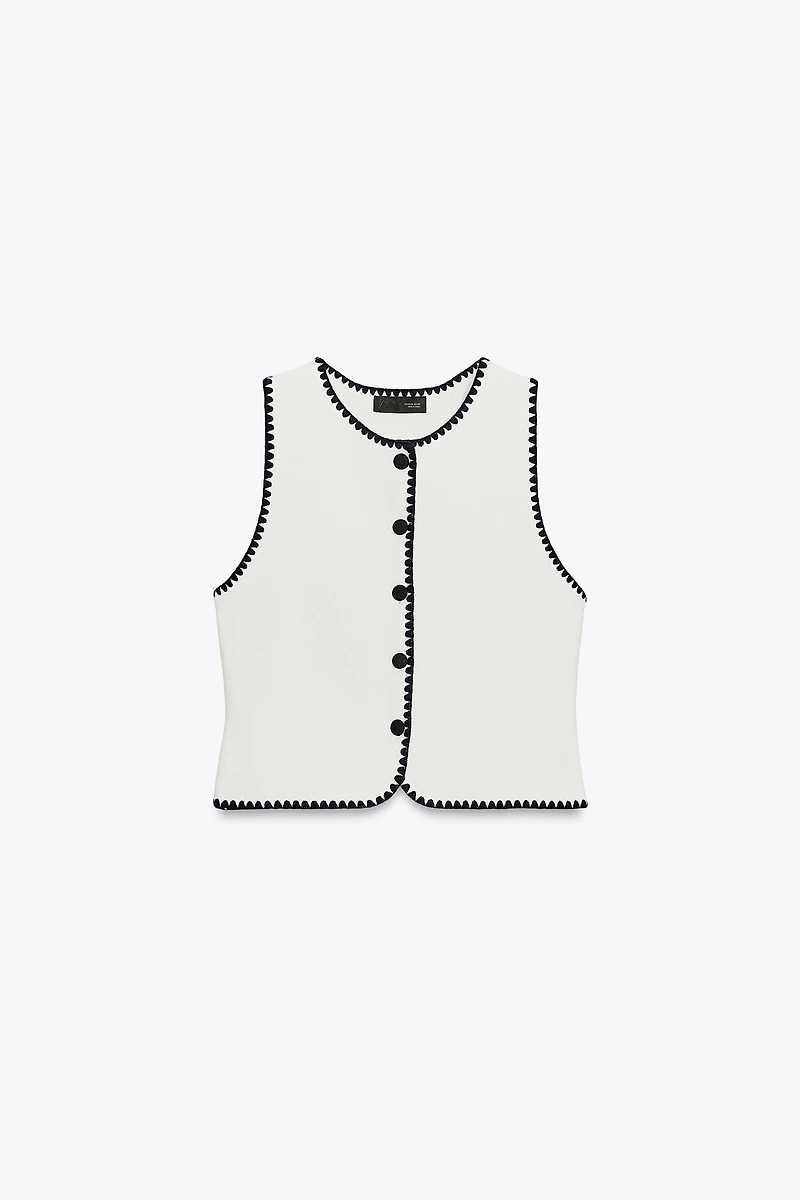 GILET EN MAILLE BRODERIES CONTRASTE