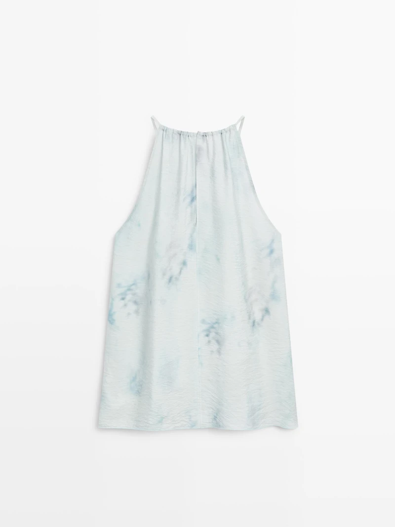 Flowing halterneck top with tie detail