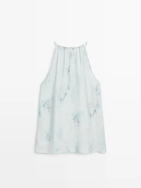 Flowing halterneck top with tie detail