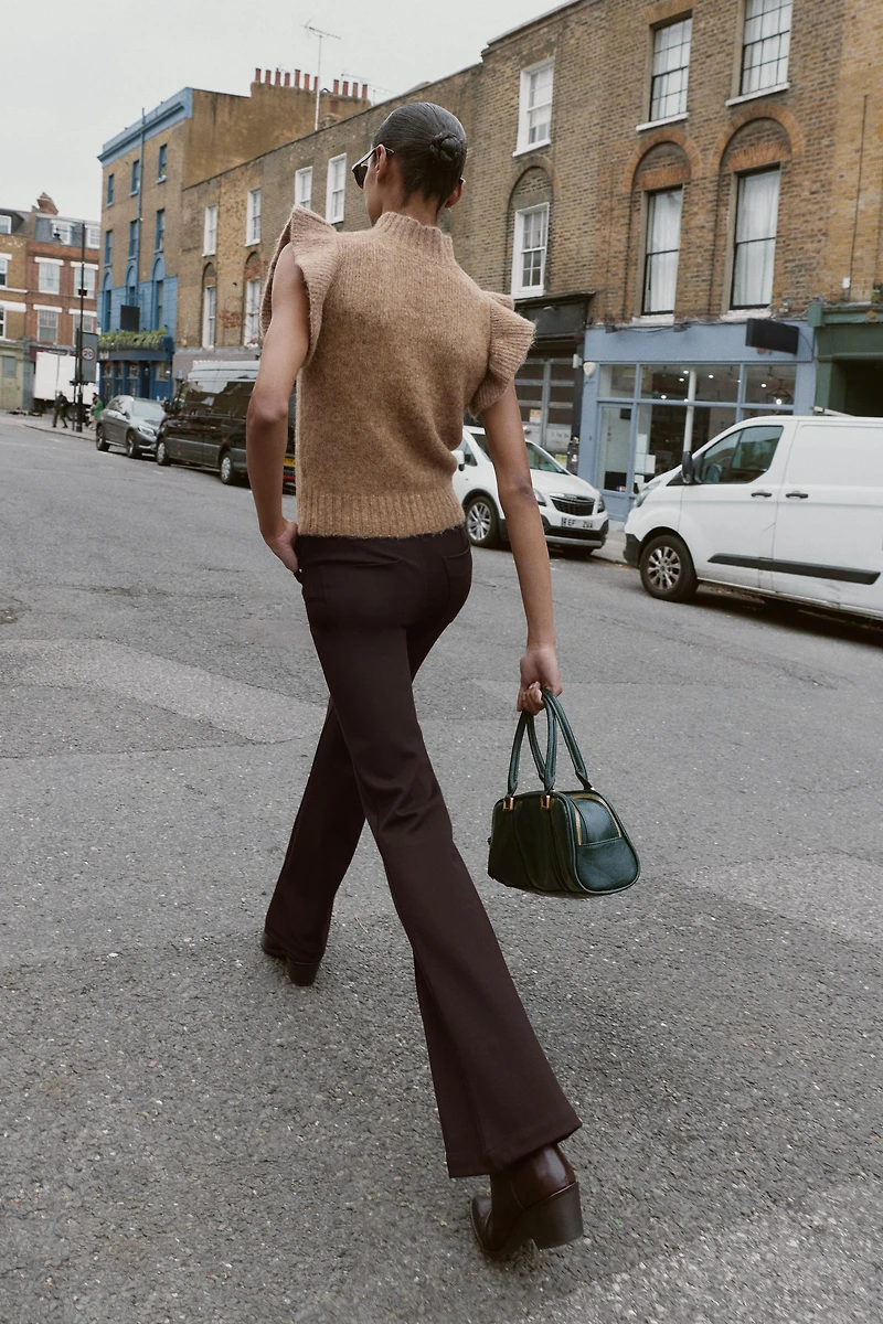 WOOL VEST WITH RUFFLES