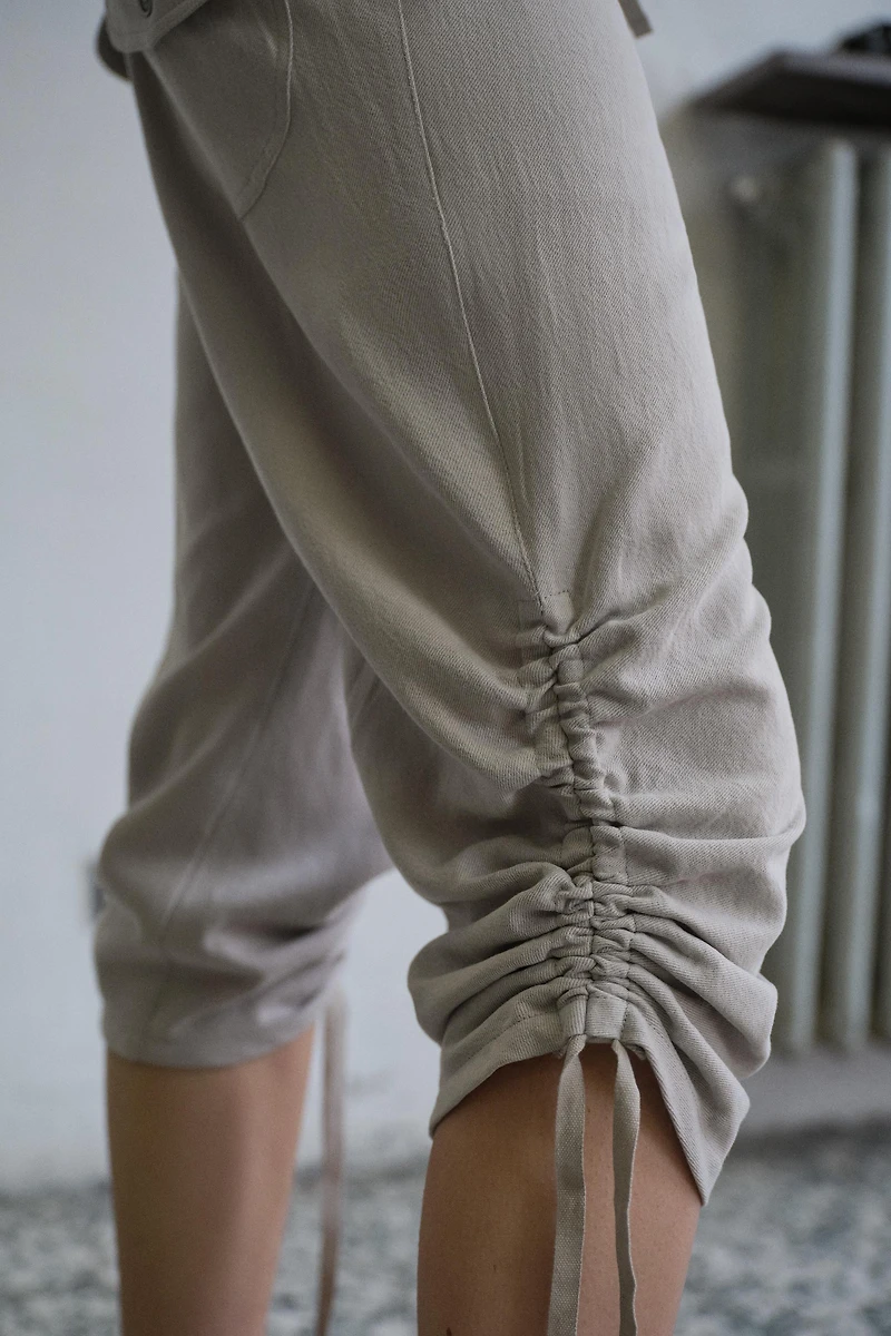 PANTALON CAPRI À PLIS