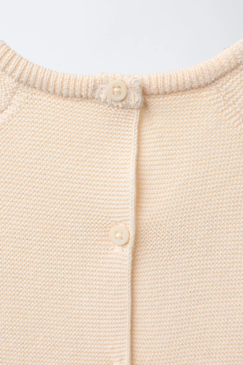 EMBROIDERED ELEPHANT KNIT SWEATER