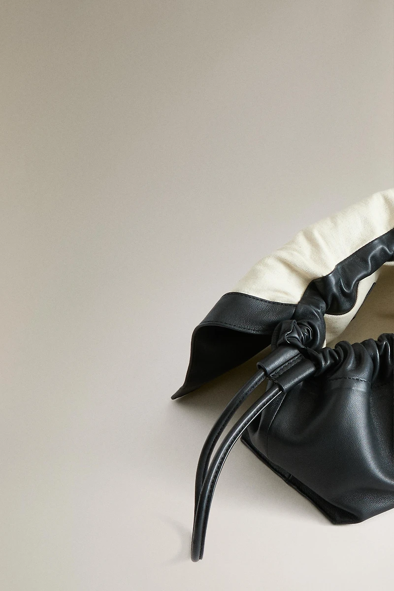 LEATHER POUCH MAKEUP BAG