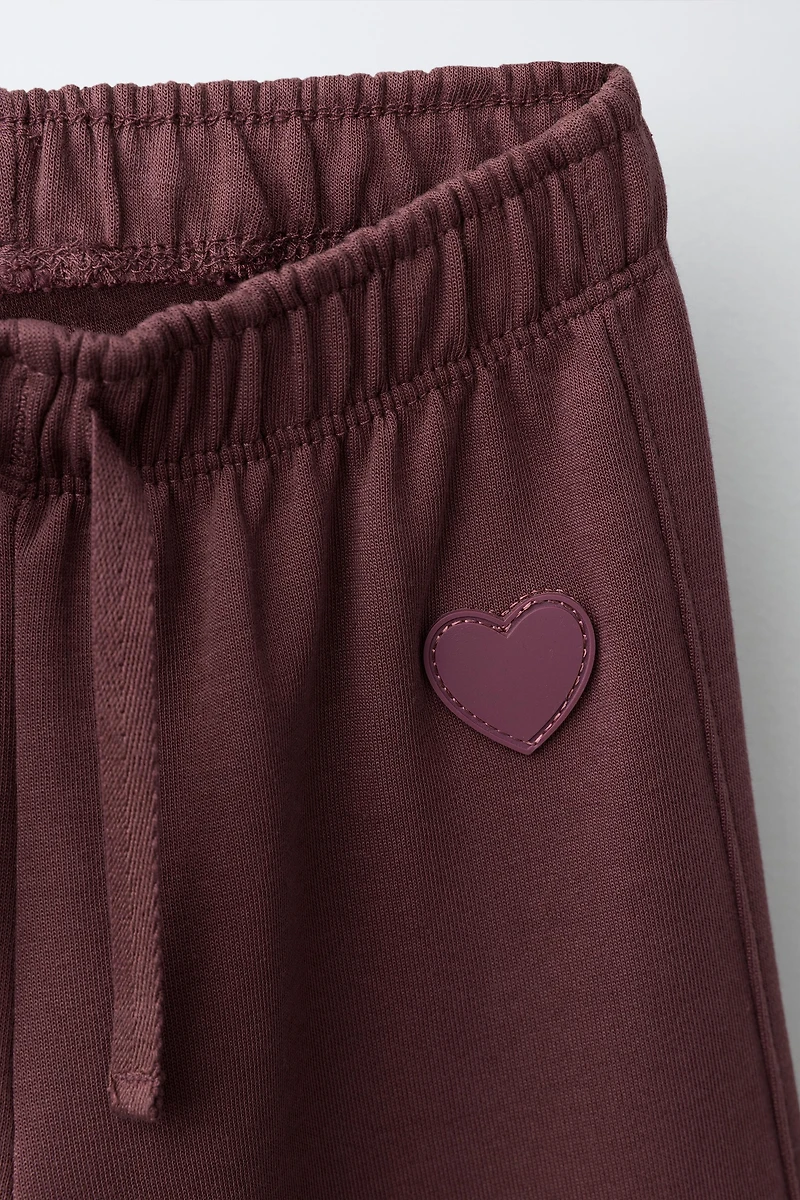 HEART INTERLOCK WIDE LEG PLUSH PANTS