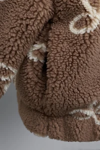 FAUX SHEARLING JACKET WITH BOW PRINT