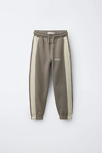 HOODIE AND STRIPED JOGGER PANTS SET