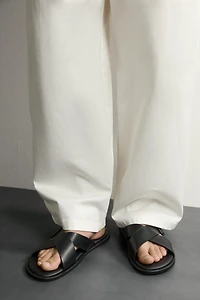BUCKLED CRISSCROSS SANDALS