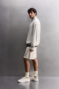 QUARTER-ZIP SWEATSHIRT WITH POCKETS