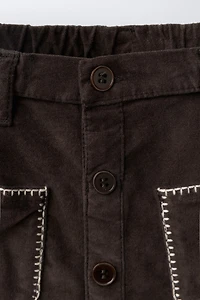 VELVET SKIRT WITH PIPING POCKETS