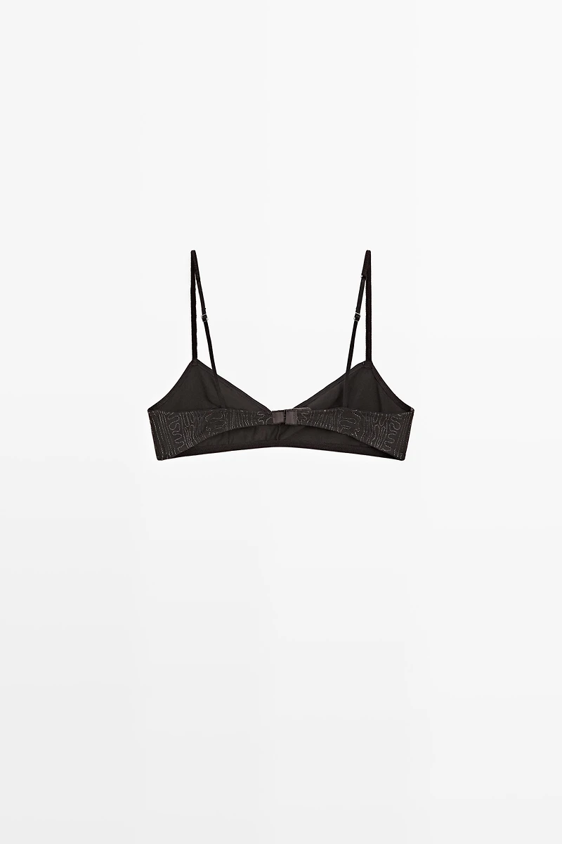 Top with embroidered detail