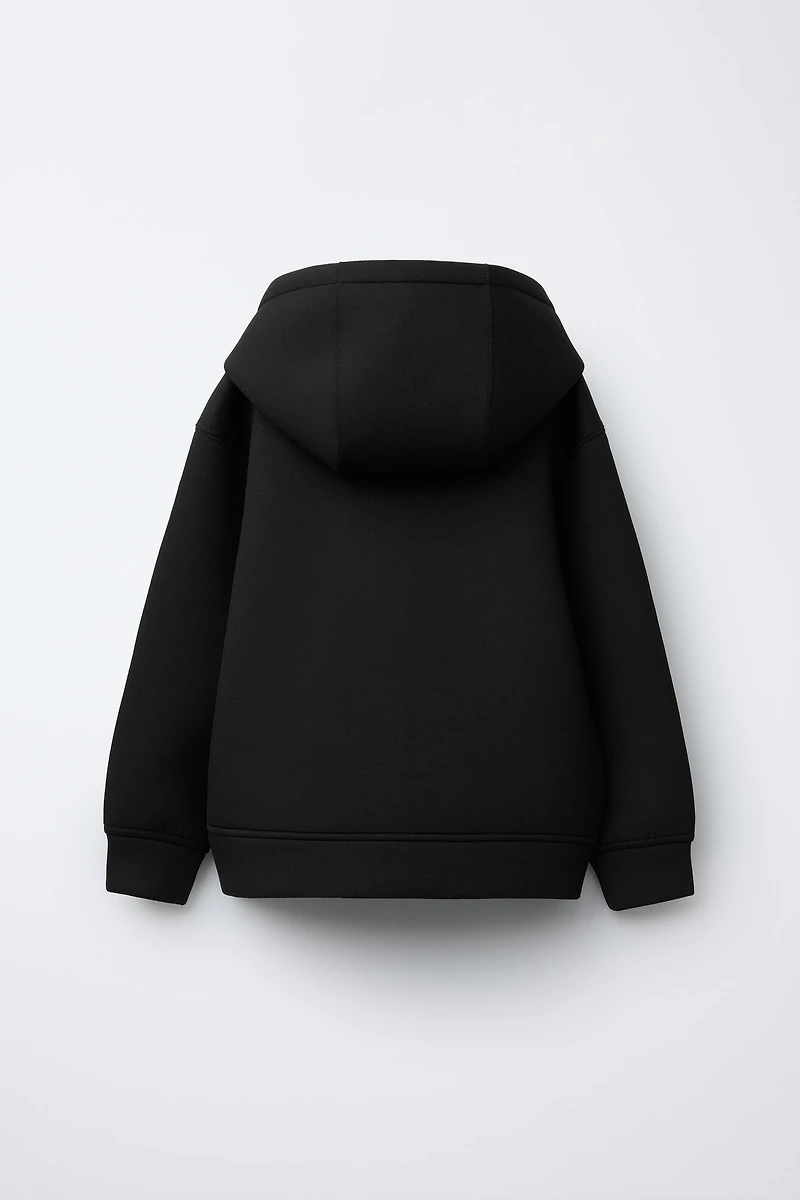 NEOPRENE-LOOK LABEL JACKET