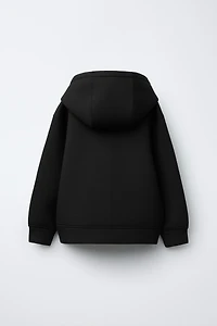 NEOPRENE-LOOK LABEL JACKET