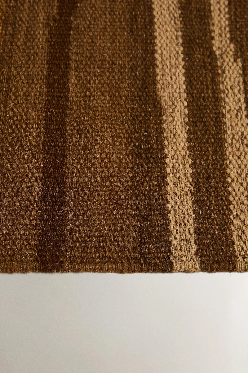 STRIPED AREA RUG WITH FRINGING