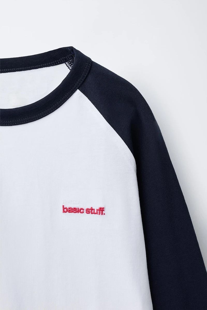 RAGLAN SLEEVE T-SHIRT WITH EMBROIDERED TEXT