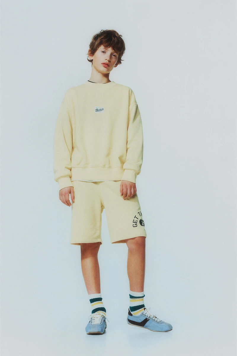 TEXT JOGGING SHORTS