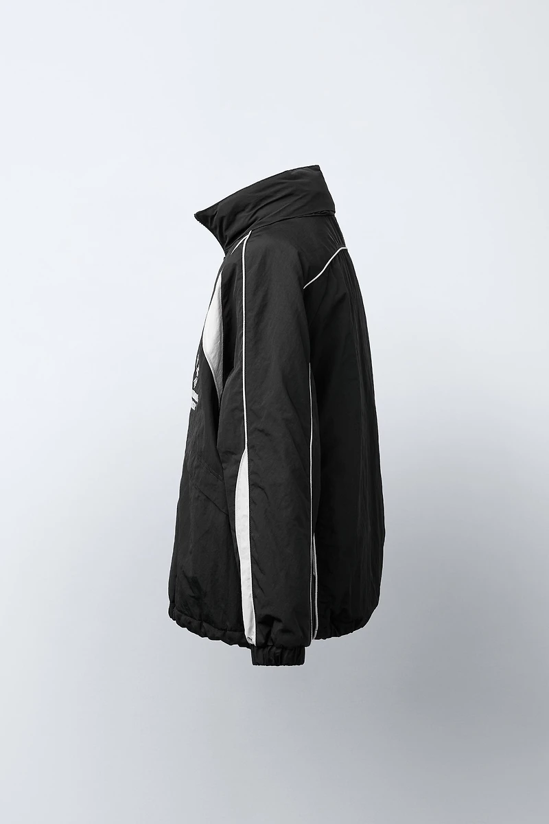 UEFA CHAMPIONS LEAGUE ® WATER REPELLENT JACKET WITH HOODIE