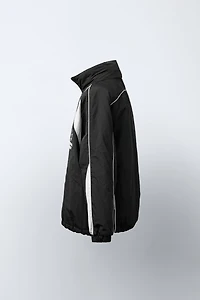 UEFA CHAMPIONS LEAGUE ® WATER REPELLENT JACKET WITH HOODIE