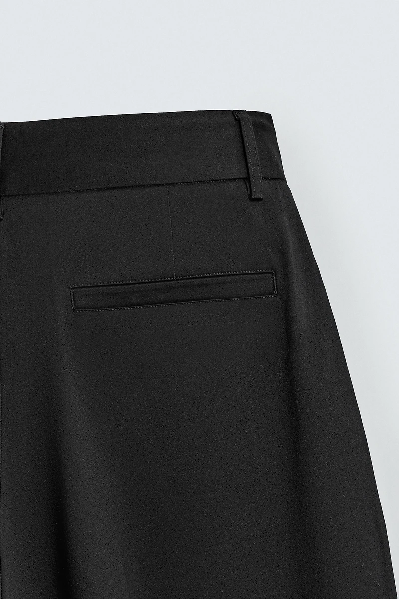 RELAXED FIT PLEATED PANTS