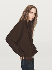 Flowing blouse with ruffles