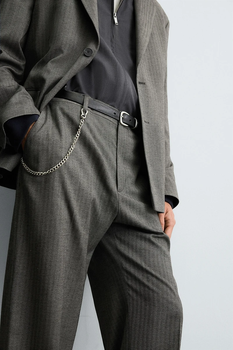 HERRINGBONE SUIT FLARE FIT PANTS
