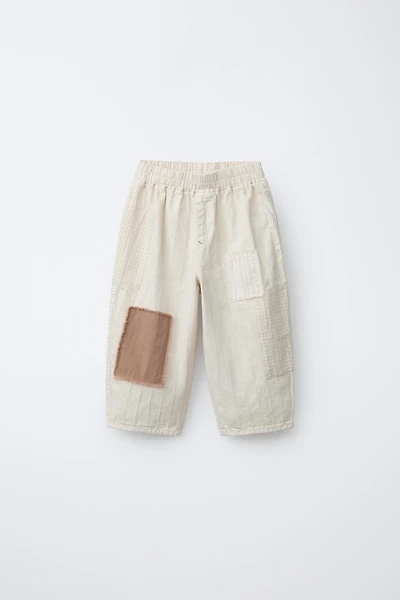 PANTALON BAGGY RUSTIQUE AVEC PIÈCES